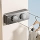 thumbnail image 1 of Tendedero retráctil de pared de aluminio ajustable hasta 4.2 metros doble línea gris, 1 of 6