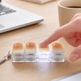thumbnail image 6 of Caramel Bread Light Up Button Clicker Fidget Toys for Adults LED Glow Plastic Mechanical Gadget Handheld Pastry Shape Office Desk Accessory Pressure Relief Tool 1 Pack, 6 of 7