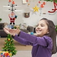 thumbnail image 4 of Bearachild Navidad Papá Noel Juguete volador Dibujos animados Avión Juguete Sensor Helicóptero Juguete de inducción para niños Niños Kits de decoración para fiestas Bearachild HA046631-02, 4 of 5