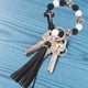 thumbnail image 4 of 2 pulseras de silicona para llaves, llaveros con cuentas gruesas, borlas de cuero, llaveros para coche en blanco y negro, cordón para llaves con cierres de langosta de aleación., 4 of 7