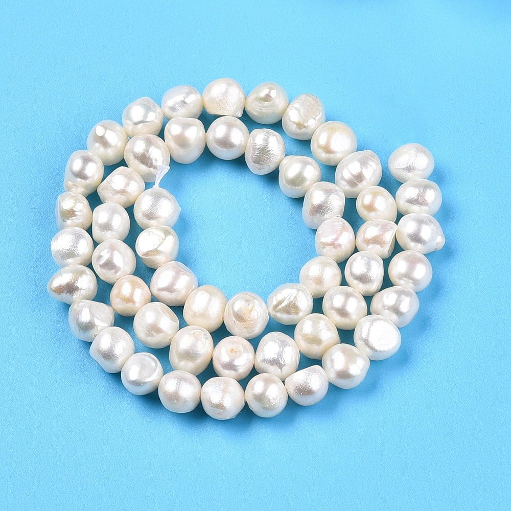 Natural Cultured Freshwater Pearl Beads Strands Two Sides Polished Creamy White 6~7.5x7~8x5~6.5mm Hole: 0.6mm 52~53pcs/strand 13.78~14.2''(35~35.5cm)