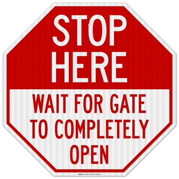 Stop Here Wait For Gate To Completely Open Sign,