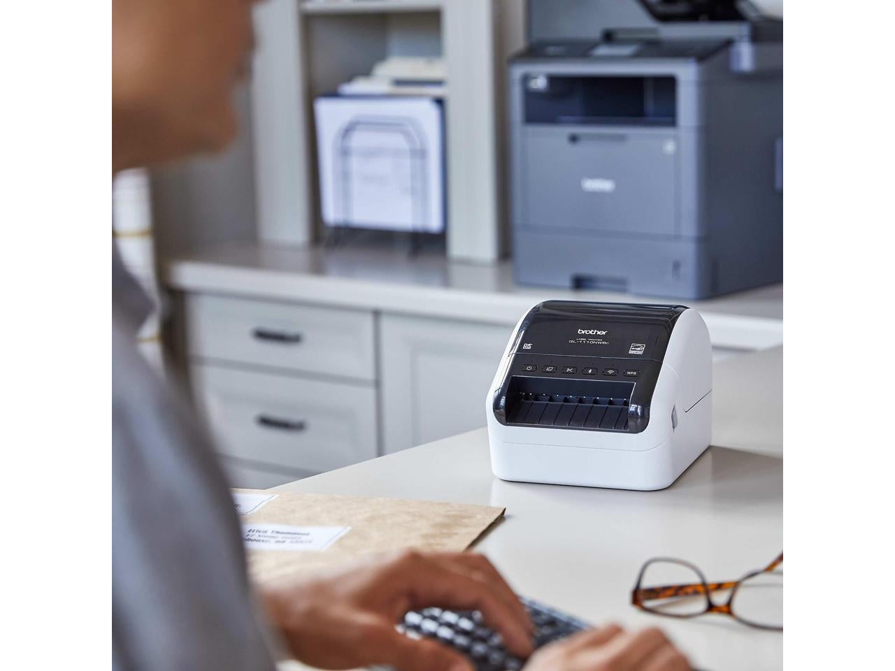 Brother QL-1110NWBc - Label printer - direct thermal - - 300 x 300 dpi - up to 69 labels/min - USB, LAN, Wi-Fi(n), Bluetooth 5.2 EDR - cutter - black, white