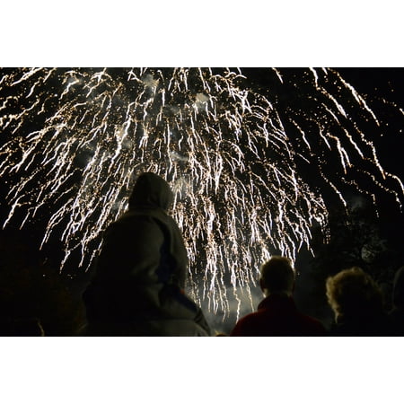 LAMINATED POSTER Community residents watch the grand finale of a fireworks display during a bonfire night celebration Poster Print 24 x