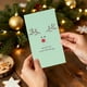 thumbnail image 1 of Tarjetas de Felicitación Navideñas de Invierno de 10 X 18 Cm | Tarjetas Navideñas de Muñeco de Nieve para Niños, Familia y Amigos | Tarjetas Navideñas de Papel Multicolor con Sobres | Deseos Festivos, 1 of 6