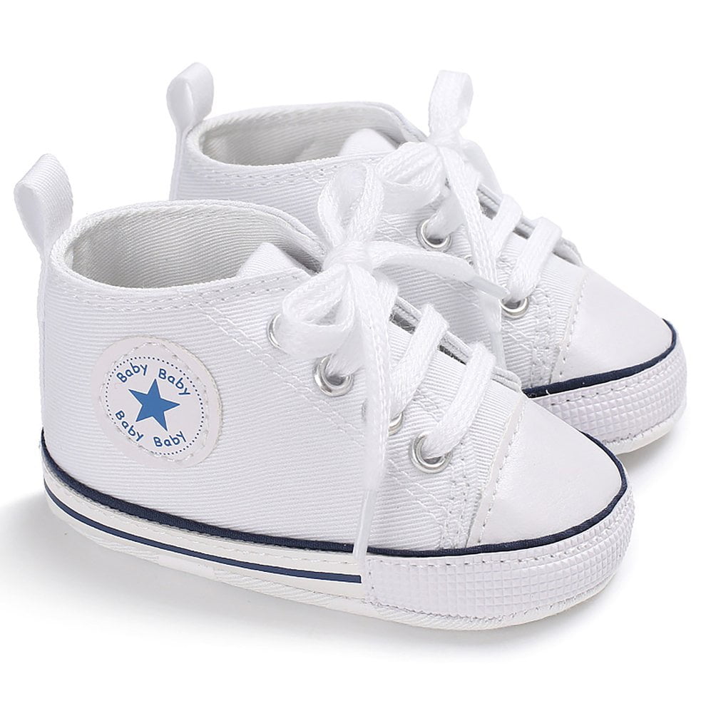 white newborn baby shoes