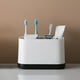 thumbnail image 1 of Organizador de cepillos de dientes de plástico negro para el baño con cepillo de dientes y pasta dental, 1 of 6