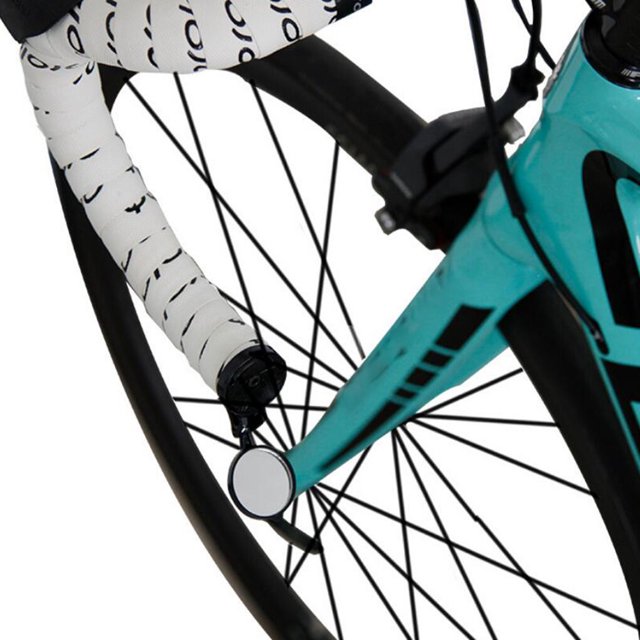 Langgg Rear Mirror Road Bike Cycling Handlebar End Mirror Safety Flexible Rear View Mirrors attached to the end of a road bike handlebar. The compact and stylish mirror is shown in a close-up view, highlighting its adjustable perspective and universal rotating design for better orientation. The bike handlebar is wrapped in white tape with black accents, and the turquoise bike frame is partially visible.