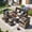 Black, variant on MEISSALIVVE 7 Pieces Patio Furniture Set with Dining Table, Outdoor Wicker Conversation Set with Wood Armrest Chairs, 2 Ottomans, Gray