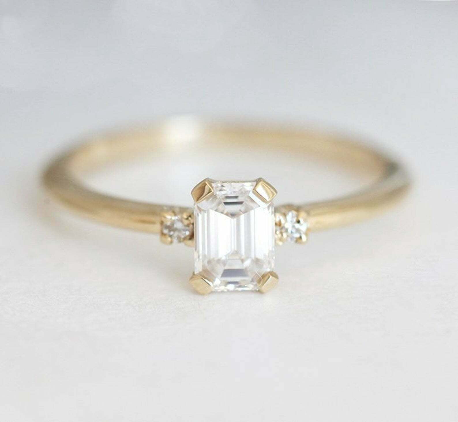 HeartsAndYou 1.2ct Emerald Cut Moissanite Engagement Ring for Women 18k Yellow Gold Over Silver Trilogy
