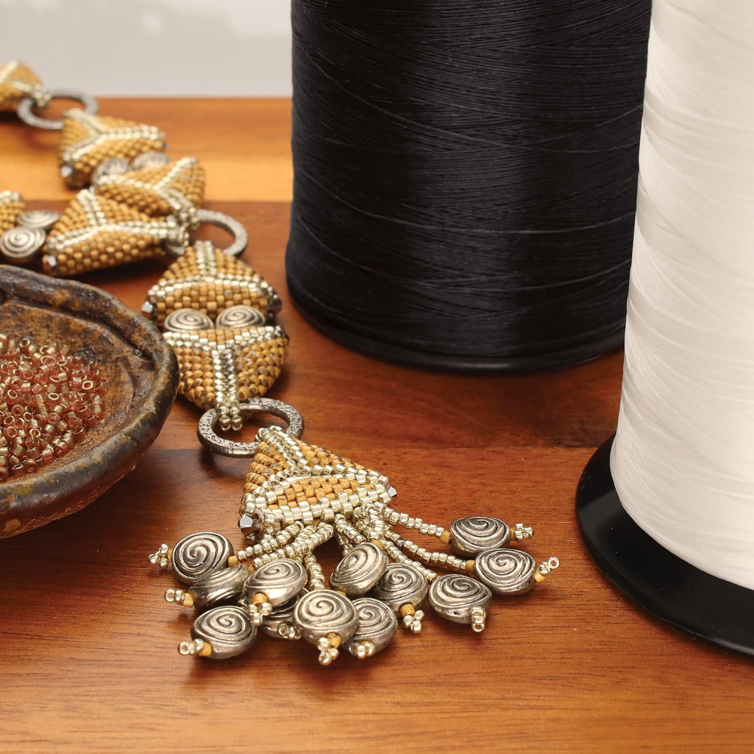 The Beadsmith Nymo Thread – Black Color, Size D, 3oz. Cone, 1584 Yards, Pre-Waxed, 100% Nylon – Tangle Resistant Knotting Cord – Use for Seed Bead Projects, Loom Work and Bead Weaving