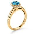 thumbnail image 3 of Gem Stone King 10K Yellow Gold American Blue Mystic Topaz and White Lab Grown Diamond Halo Engagement Ring for Women (1.13 Cttw, Gemstone, Oval 7X5MM, Size 7), 3 of 4