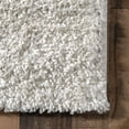 thumbnail image 5 of nuLOOM Kara Solid Shag Ivory 6' 7" x 9' Casual Area Rug, 5 of 9