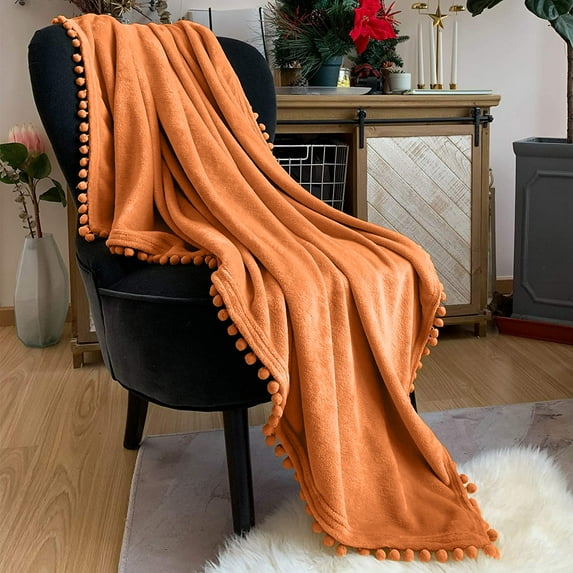 LOMAO Flannel Blanket Soft Throw Blanket with Pompom Fringe Lightweight Bed Blanket Fit Couch Sofa(70"x 80")(Orange)