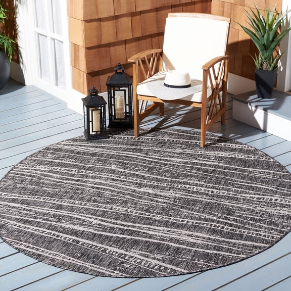 SAFAVIEH Courtyard Kasandra Abstract Indoor/Outdoor Area Rug, Black/Ivory, 6'7" x 6'7" Round