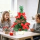 thumbnail image 4 of Adorno navideño retráctil mini de 30 cm | Decoración navideña de escritorio | Árbol de mesa de plástico ensamblado a mano con lazos y adornos navideños | Dorado, rojo, azul y verde, 4 of 6