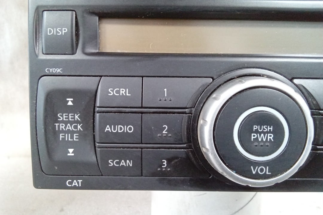 Pre-Owned 2007 Nissan Versa AM FM 6 Disc CD MP3 Receiver CY09C OEM LKQ - Verify Specific Vehicle Fitment In Description - (Good)