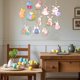 thumbnail image 5 of Conjunto de adornos colgantes en espiral para Pascua: conejitos y huevos para decorar fiestas de Pascua y celebraciones primaverales., 5 of 7