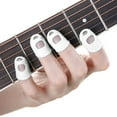thumbnail image 1 of 12 Pcs Thin Medium Celluloid Guitar Thumb Picks Finger Cap Protect Fingers for Splicing Line Pressing Elastic Ukulele Finger Hat WHITE, 1 of 6