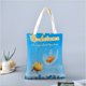 thumbnail image 2 of Gudetama: An Eggcellent Adventure Bolso de tela con estampado de lienzo para mujer, bolsa de compras reutilizable y estética, con cremallera interior, regalo para mujer, 35 × 40 cm., 2 of 6