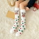 thumbnail image 1 of Calcetines navideños de polar hasta la rodilla para mujer | Forro polar coral extra grueso y cálido | Medias festivas con estampados de Papá Noel, muñeco de nieve y reno | Medias de invierno, 1 of 5