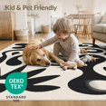 thumbnail image 4 of ODIKA 8'x10' Washable Area Rug Non-Slip Chair-Friendly Mat Black White Abstract Artistic Design Contemporary Fluid Shapes with Star Motifs for Dining Room, Large Office, Lounge, 4 of 7