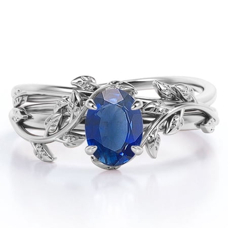 JeenMata Botany - 1.3 TCW Oval Shaped Lab Created Blue Sapphire - Four Prong Solitaire Bridal Set - 18K White Gold Plating over Silver