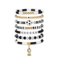 thumbnail image 1 of Set de pulseras Poasrelax 2026 de fútbol, 7 piezas, negro y blanco, 1 of 5