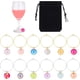thumbnail image 1 of Set de 24 marcadores y etiquetas para copas de vino en 12 colores, de resina. Incluye 40 anillos de latón para marcar las copas., 1 of 6