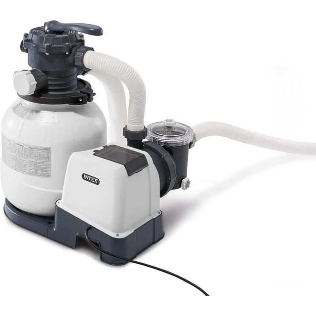 Intex Krystal Clear Sand Filter Pump with 2100 GPH capacity featuring a white sand filter tank, black multiport valve handle, and attached flexible hoses on a dark base.