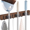 thumbnail image 1 of Soporte de pared para escobas y trapeadores OUTNILI con 3 ranuras y 4 ganchos, 1 of 7