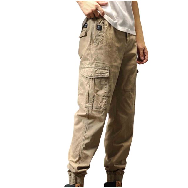 Pantalones largos de moda para hombre, casuales, de color sólido, con bolsillos y cremallera, cintura elástica, de poliéster.