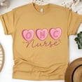 thumbnail image 1 of ONC Nurse Graphic T-Shirt with Pink Heart Letters Design, Gold, Size M, 1 of 6