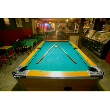 Pool table lit by electric lights in a restaurant and bar in Shoshone, CA near Death Valley Nati... Print Wall