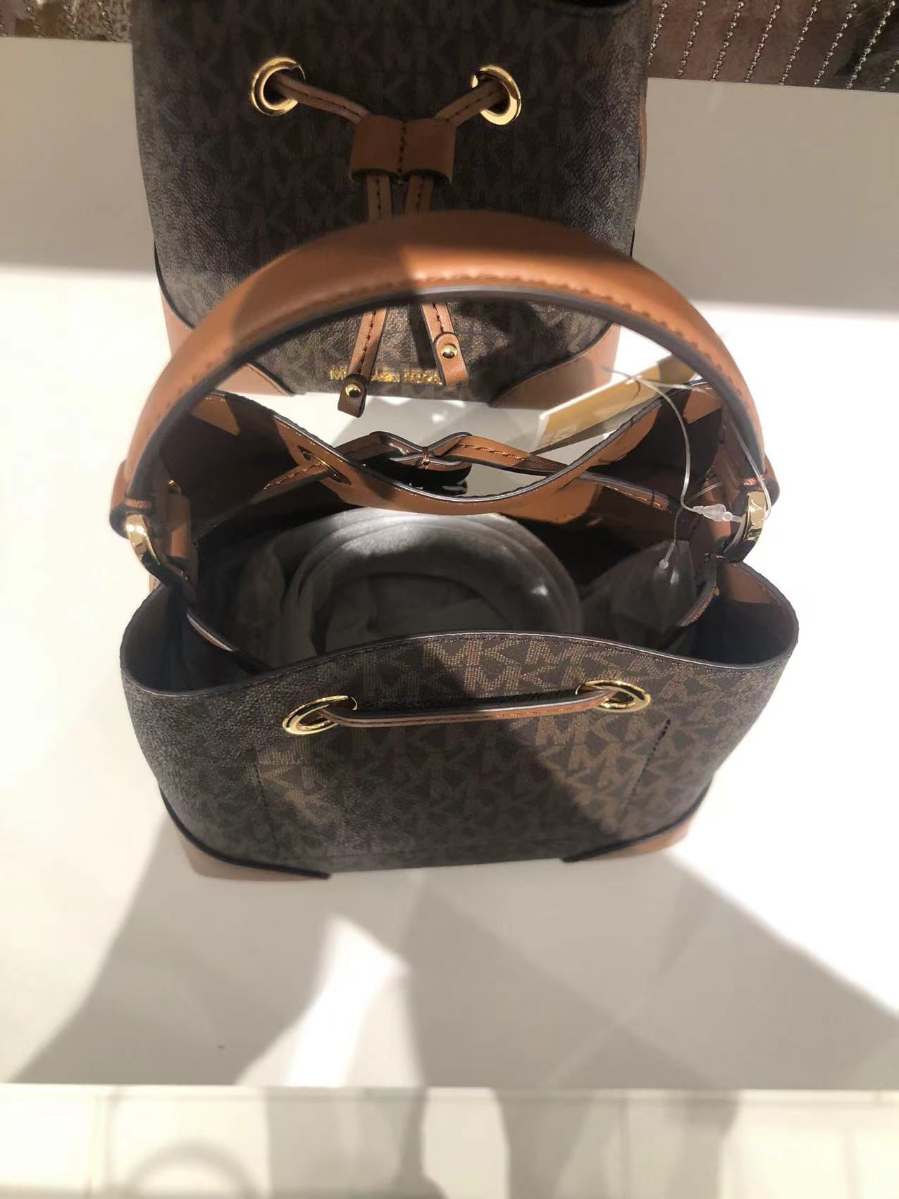  Michael Kors Small Suri Bucket Bag Tote Crossbody Black MK  Signature Leather PVC : Clothing, Shoes & Jewelry