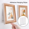 thumbnail image 4 of sunsanly 12 Pairs Picture Hanging Strip Heavy Duty Sticky Picture Hanger Removable No Nails Adhesive Photo Frame Mounting Artwork Poster Wall Hanging Tape, 4 of 7