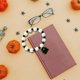 thumbnail image 4 of Pulsera de Halloween Fiudx con calabaza decorada a mano y cuentas de color naranja, 4 of 4