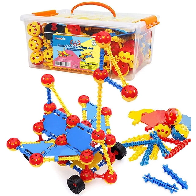 bloques de construcción para niños pequeños, juguetes de construcción stem construcción de aprendizaje educativo caja transparente con asa que contiene piezas multicolor. Vista 3/4 frontal con conjunto armado de bolas rojas perforadas conectadas por varillas azules y amarillas, placas planas azules, ruedas negras y conectores de distintas longitudes visibles. Adecuado para niños de 3 a 10 años; a menudo usado como juego portátil de actividades manuales durante viajes.
