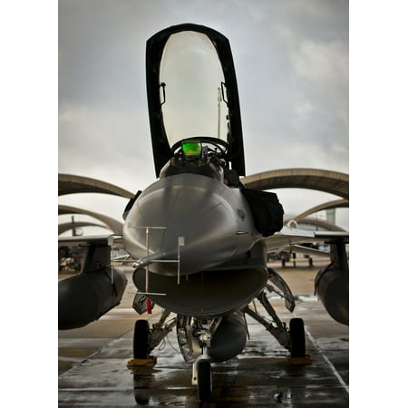 - LAMINATED POSTER A 96th Test Wing F-16 Fighting Falcon pilot prepares his aircraft for a morning sortie at Eglin Air Poster Print 24 x 36