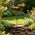 thumbnail image 4 of Comedero y bebedero metálico para pájaros, ideal para jardín o patio. Se instala en el suelo al aire libre y cuenta con una abertura ajustable para que los pájaros se alimenten y se bañen., 4 of 6
