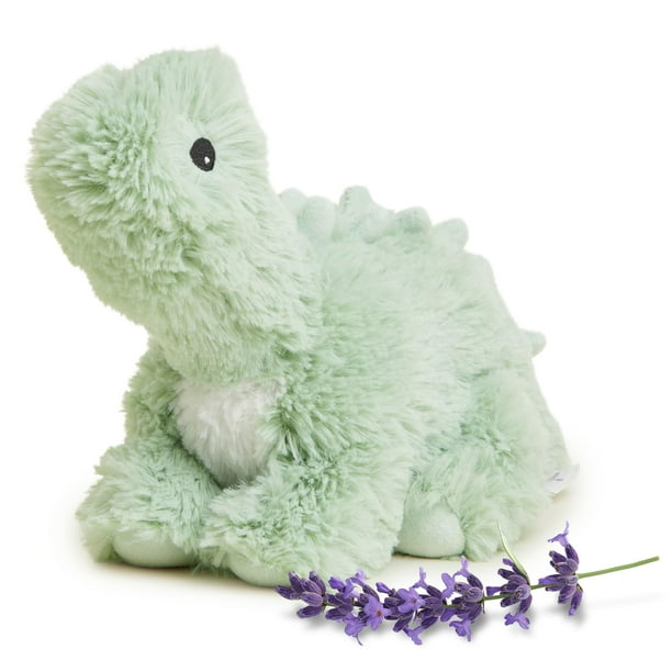 Un animal de peluche calienta dinosaurios verdes pesados y aptos para microondas