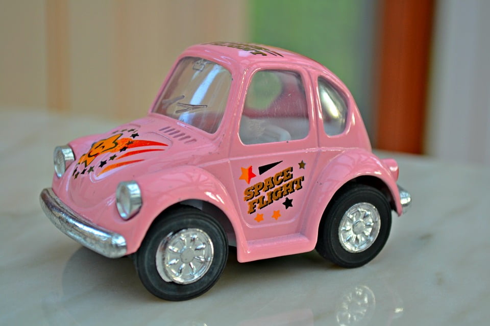small pink toy car