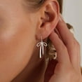 thumbnail image 5 of Sunyuer Gold Bow Earrings for Women Trendy, Cute Bow Earring 18k Gold Plated Dainty Bow Drop Dangle Earrings Hypoallergenic Gold Earrings Christmas Earrings for Women Jewelry Gift, 5 of 5
