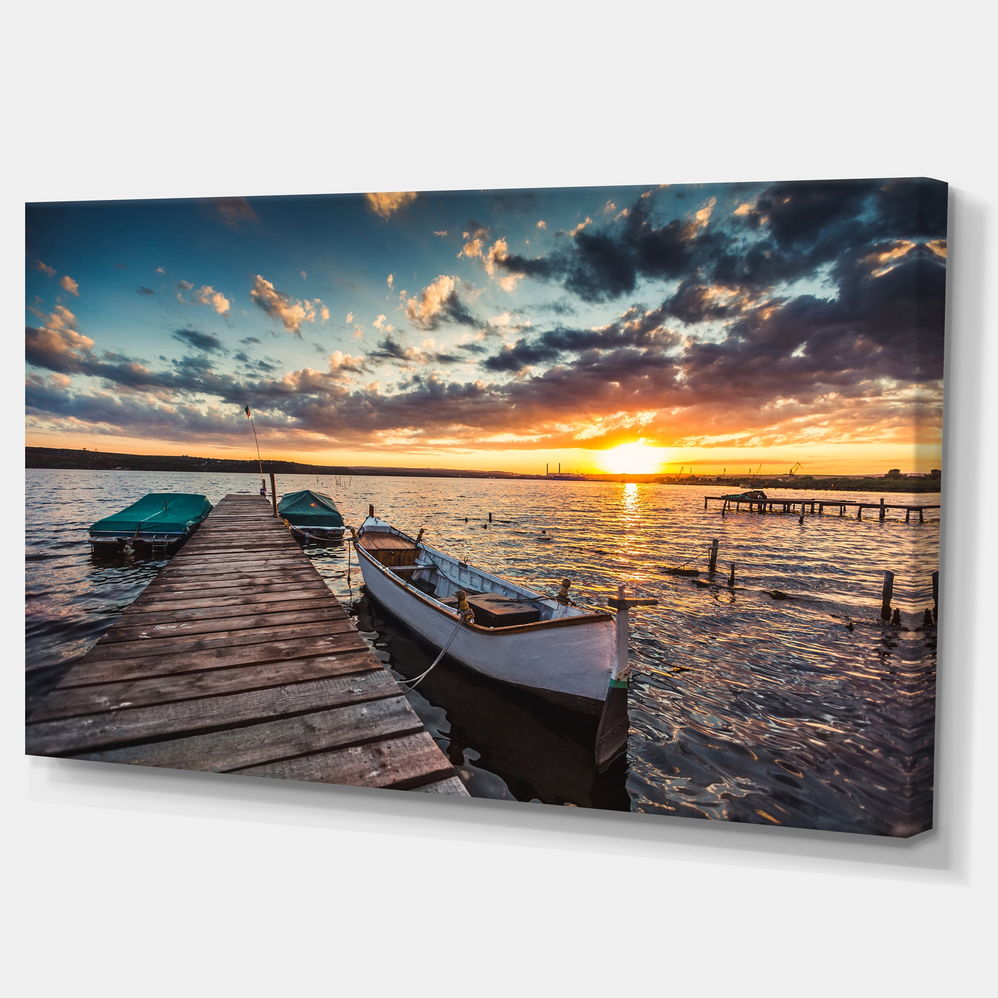 Designart 'Boats and Jetty under Dramatic Sky ' Modern Canvas Art Print