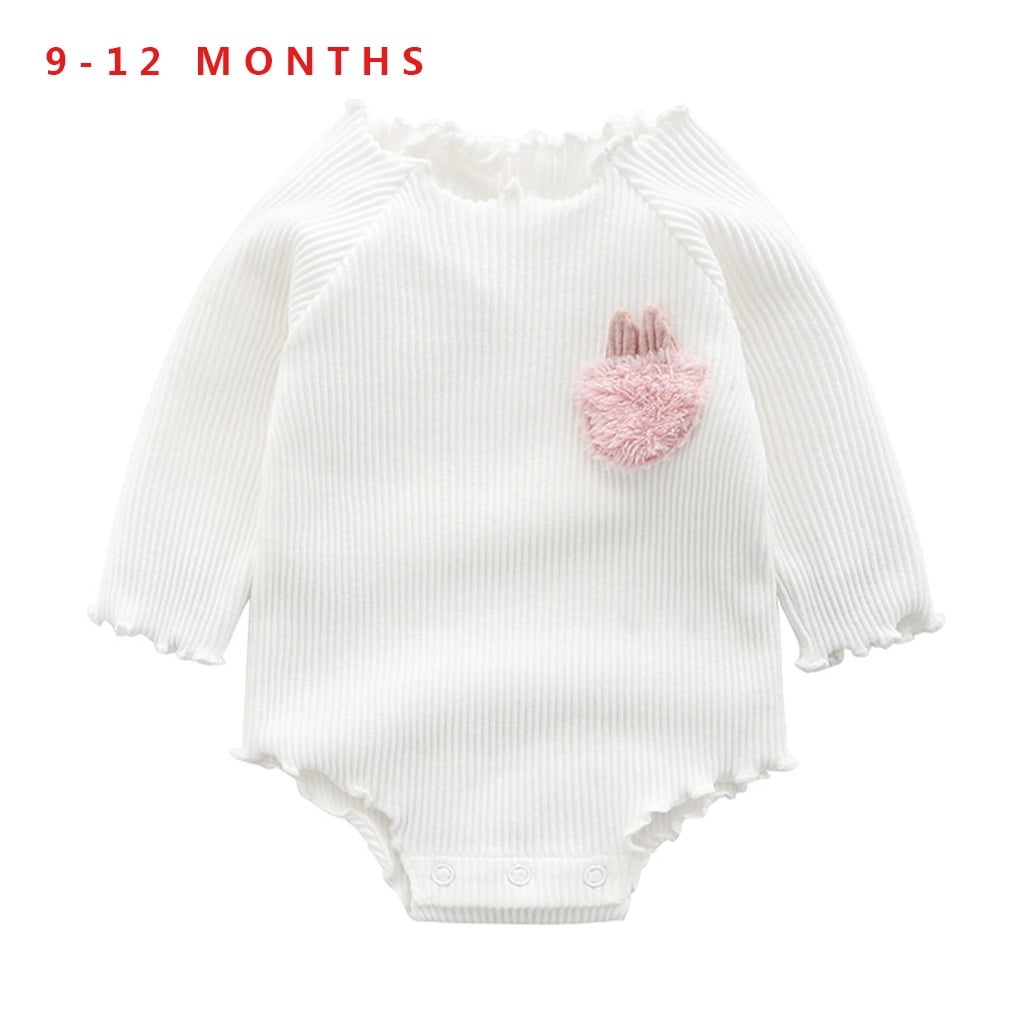 white newborn romper