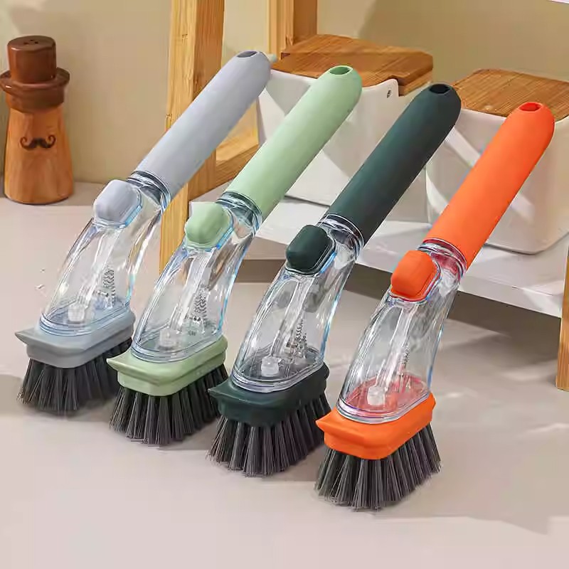 Pot brush, comfortable and long handle, does not dirty hands, does not hurt the pot, comes with a space for storing detergent, and automatically discharges liquid when pressed.