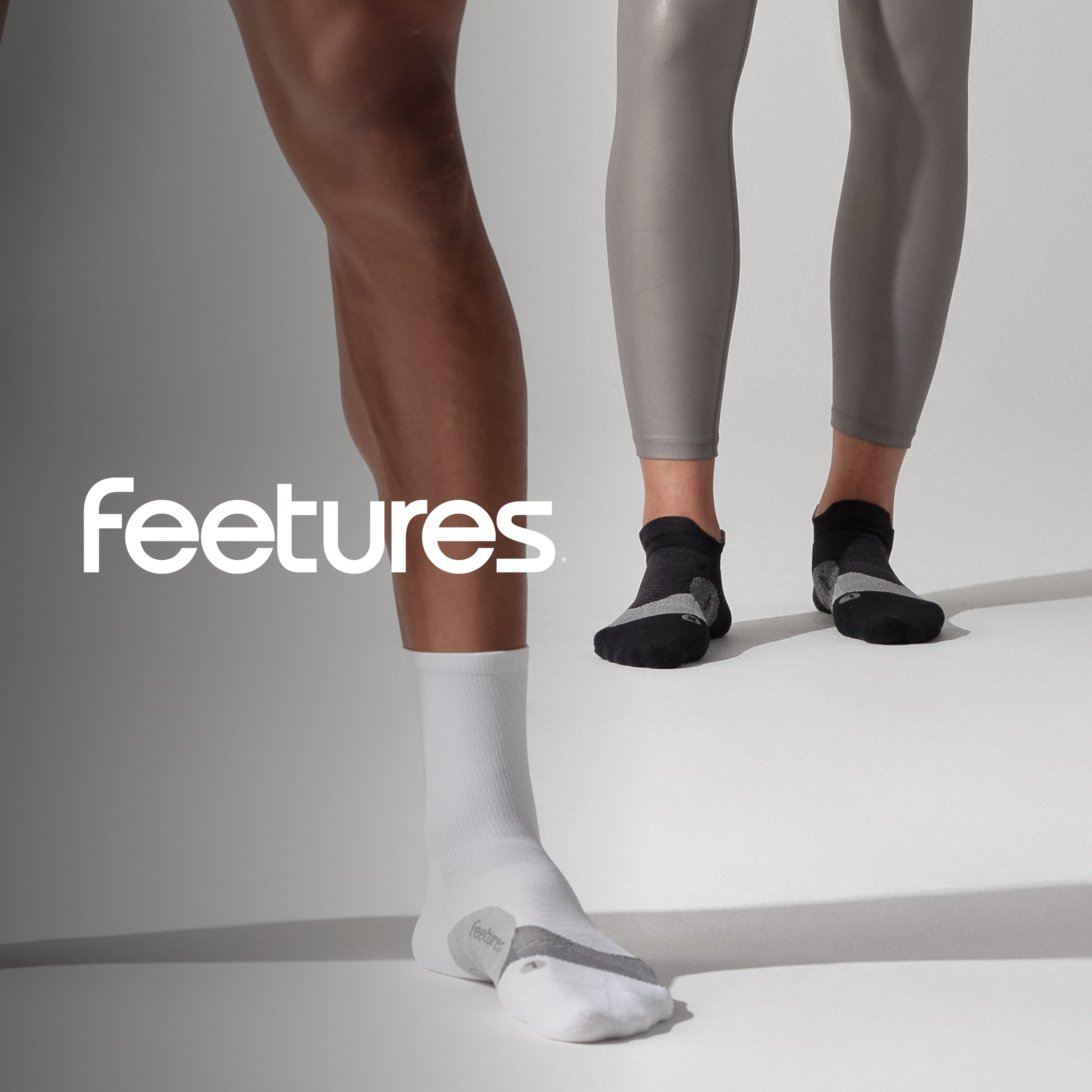Feetures Elite Ultra Light Cushion Ankle Socks - Sport Sock with Targeted Compression - New White, M (3 Pair)