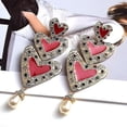 thumbnail image 1 of Pendiente largo de metal con forma de corazón y cristales de alta calidad en color rojo, 1 of 5