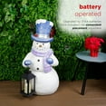 thumbnail image 4 of Alpine Corporation SKY562L-TM Lavender Winter Snowman Holding Lantern Statue with Warm White Flashing LED Candle, 3 Feet Tall, Indoor/Outdoor Holiday Decoration , Christmas Decoration, 4 of 12