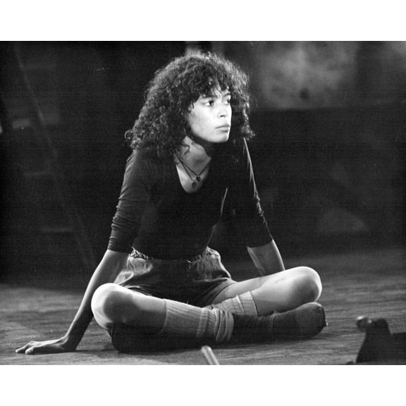 Erica Gimpel sitting on dance studio floor as Coco Hernandez Fame TV 8x10 photo